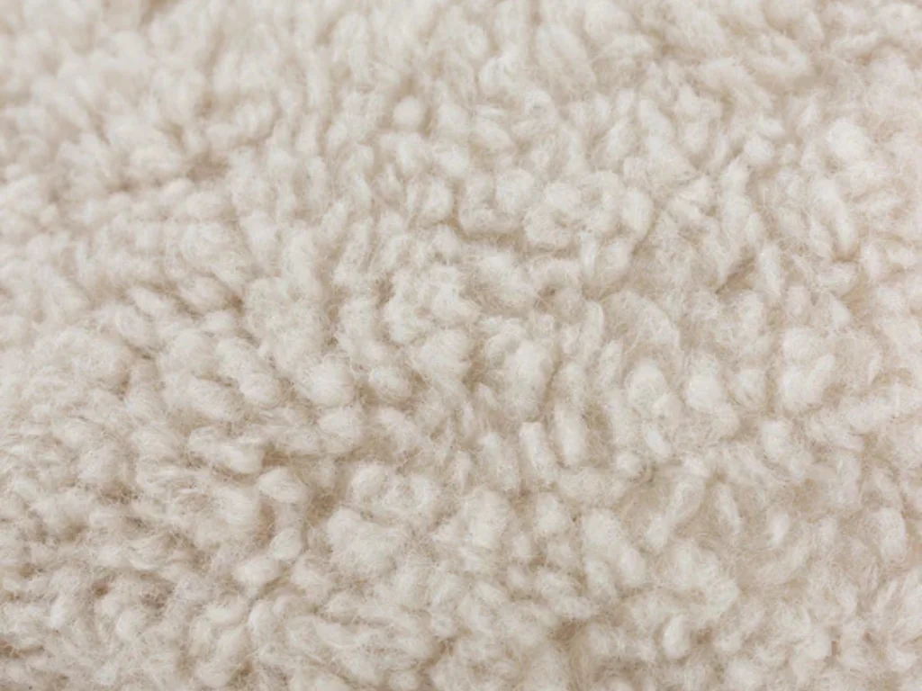 Yard Olann faux shearling cushion natural