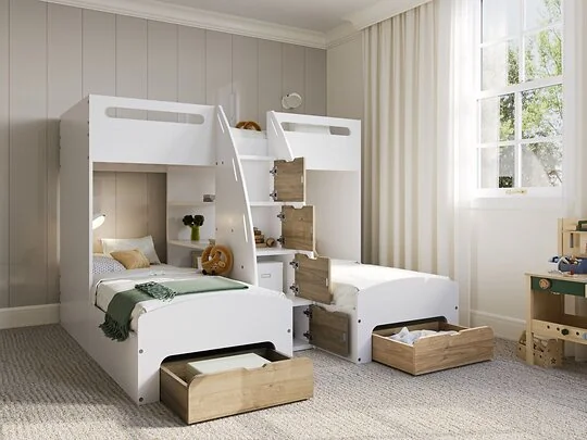 Flair Eddie triple bunk bed in white & oak with storage staircase and lower bunk drawers open in a child's bedroom