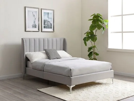 Kyoto Avery velvet upholstered bed with linear stitch detailing on the headboard and angular metal legs.