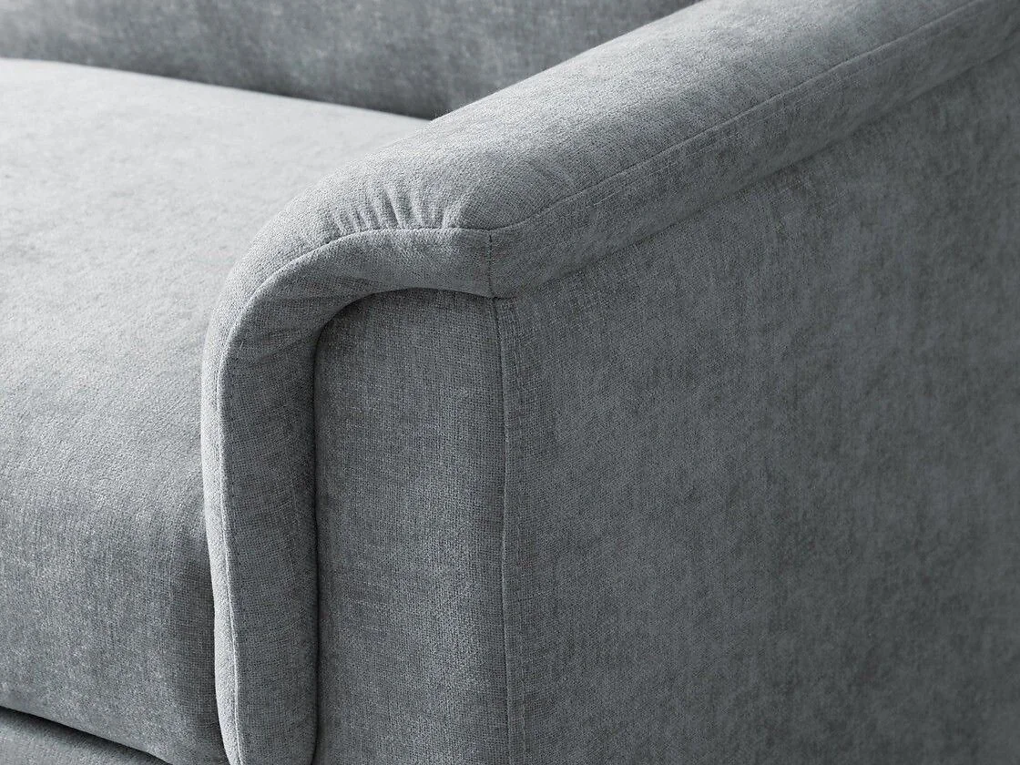 Kyoto Beckett sofa bed in Grey chenille with curved armrests and seam detailing on the backrest
