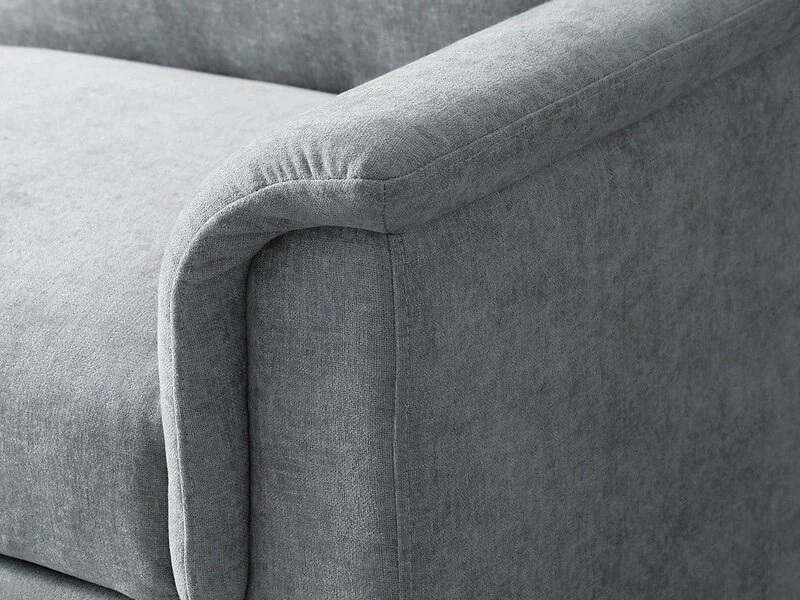 Kyoto Beckett sofa bed in Grey chenille with curved armrests and seam detailing on the backrest