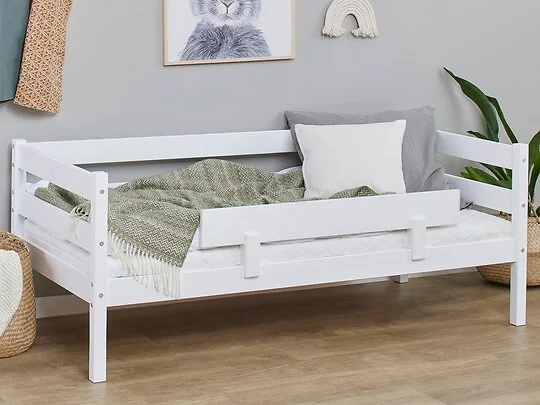 Toddler transition bed with removable guard rail