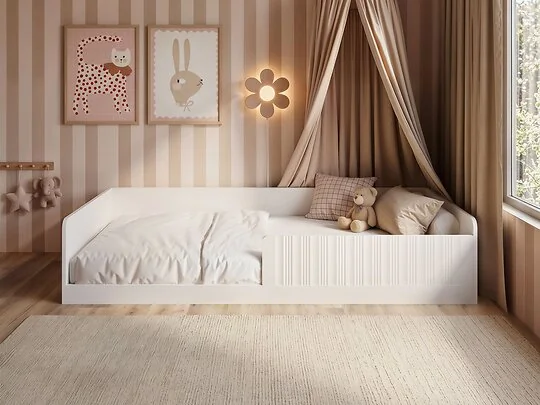 Flair Nadia single Montessori floor bed in pink in a child's bedroom with canopy